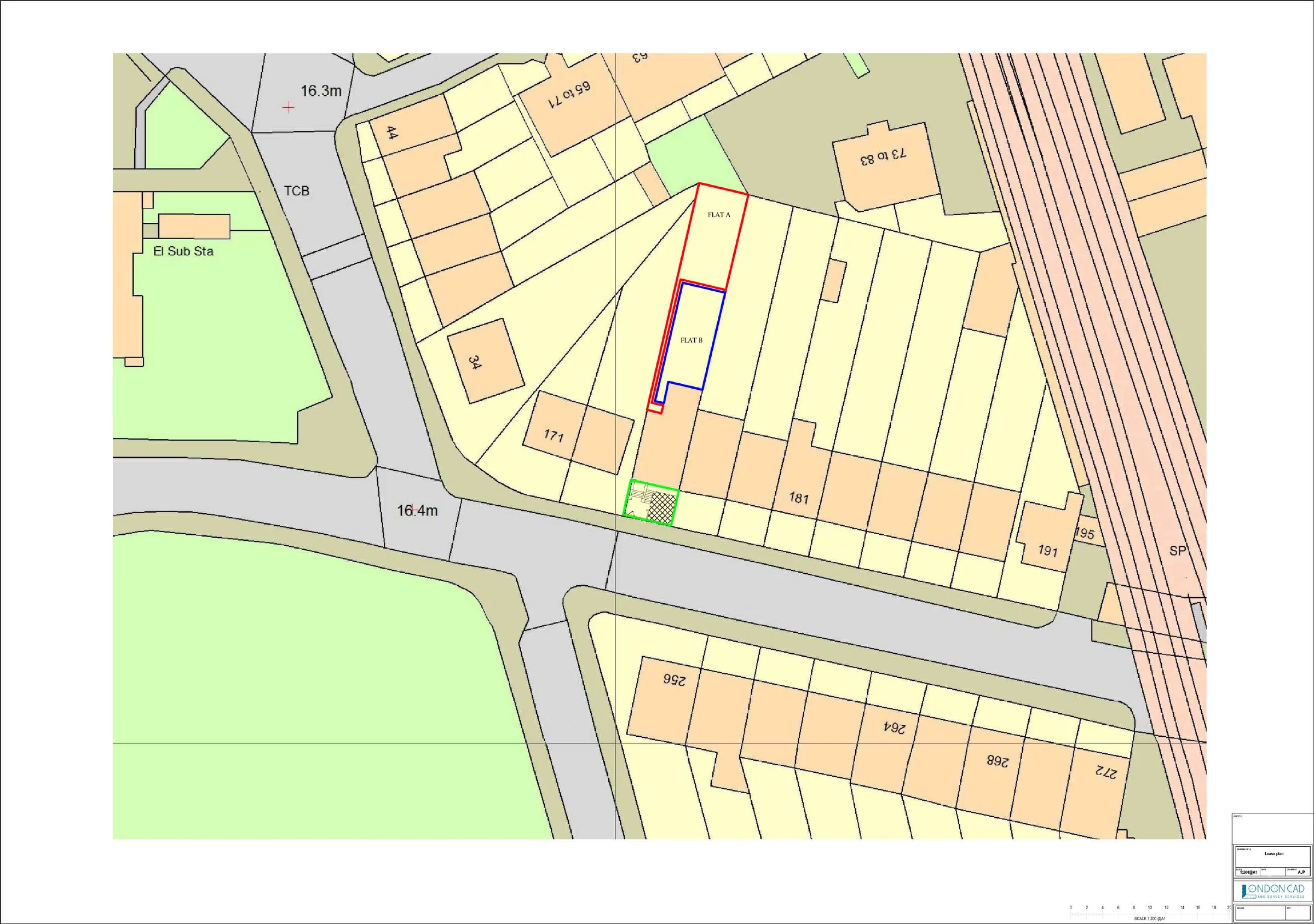 Coloured lease plan on a mapped base identifying two flats edged in red and blue and a separate area edged in green